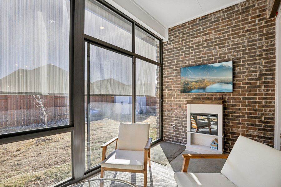 Sunroom / solarium with outdoor lounge area