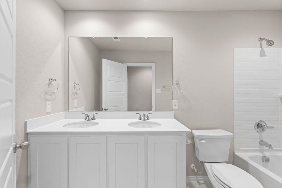 Representative exterior photo of a completed home built from the Willow by Impression Homes in Creekside Ranch, Blue Ridge, TX (Image 22).