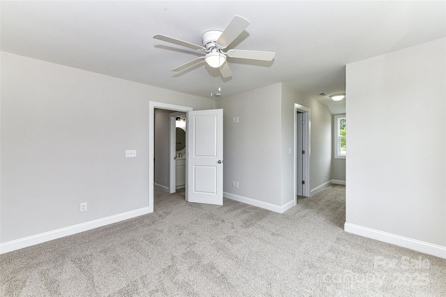 Secondary Bedroom on upper level with ceiling fan/light! Secondary Bedroom on upper level with ceiling fan/light!