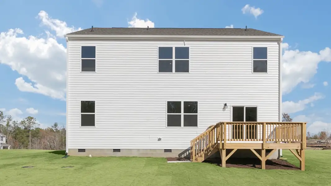 Exterior details and patio area of a home in Mason Ridge, Spring Lake (Image 4).