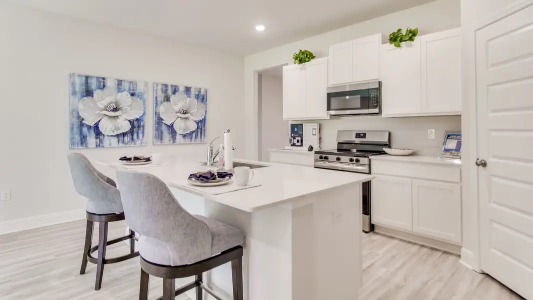 Furnished interior view inside a new home in Ashton Park Phase III, Freeport (Image 4).