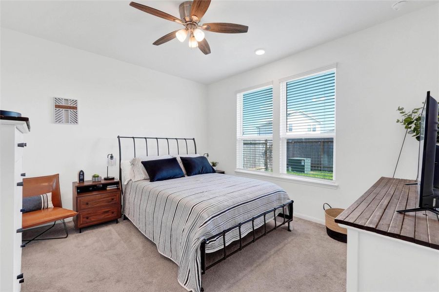 Retreat to a spacious master suite that exudes comfort and tranquility, complete with plush finishes, generous closet space, and serene views of the backyard.