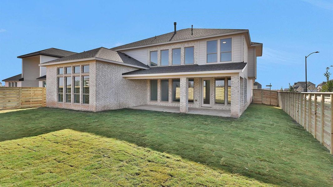 Exterior details and patio area of a home in Austin Point 60', Richmond (Image 2).