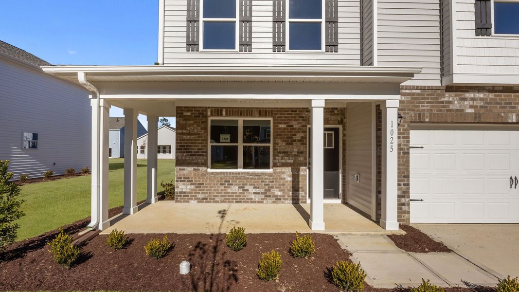 Exterior details and patio area of a home in West New Bern, New Bern (Image 3).