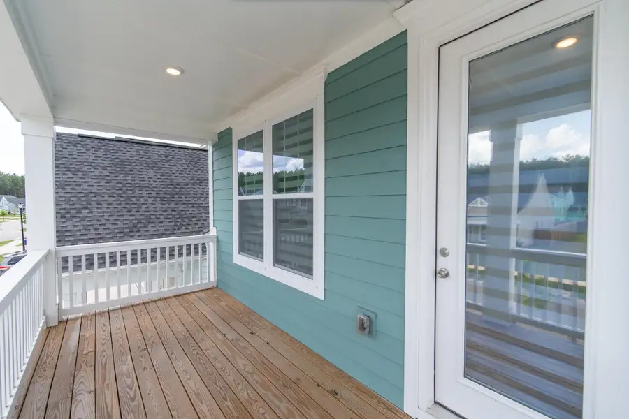 Exterior details and patio area of a home in , Ravenel (Image 31). Exterior details and patio area of a home in , Ravenel (Image 31).