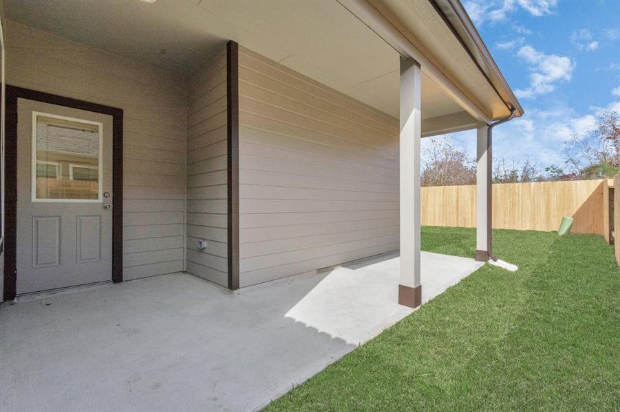 Come and see this spacious backyard with its beautiful covered patio. There is plenty of room for the kids to play and adults to relax. Perfect for your outdoor living space, patio furniture, bbq pit, and so much more. Sample photo of completed home with similar floor plan. As-built interior colors and selections may vary.