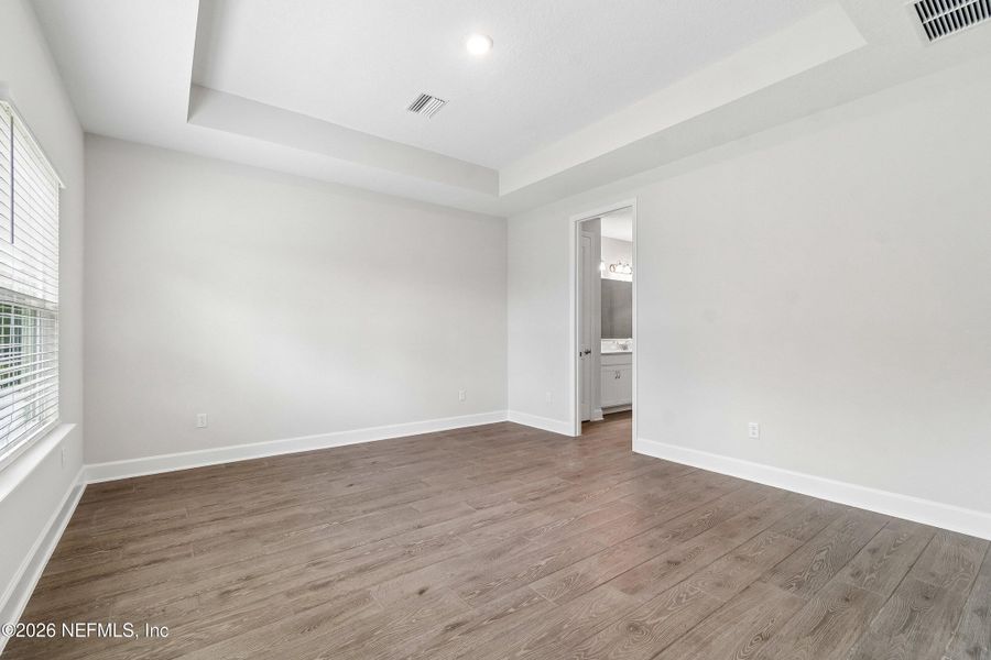 Spacious, unfurnished interior of a new home in Tributary 50', Yulee (Image 25). Spacious, unfurnished interior of a new home in Tributary 50', Yulee (Image 25).