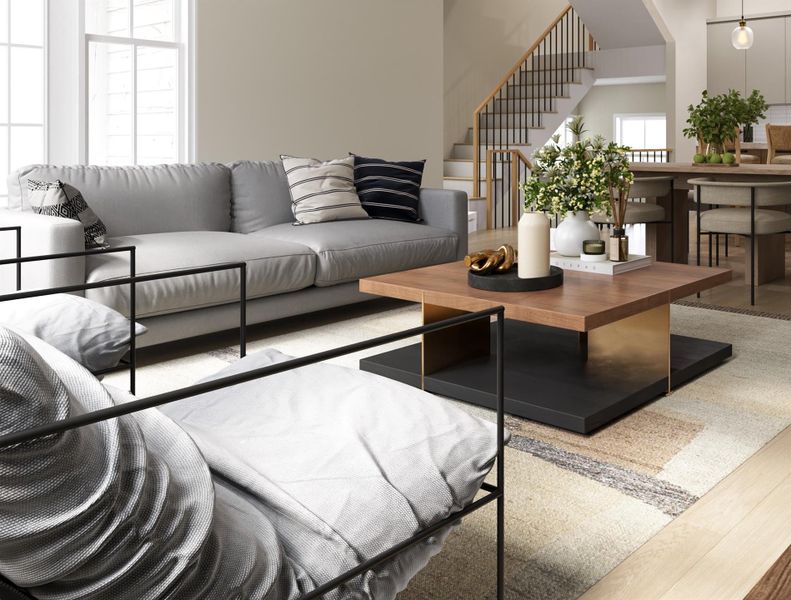 Modern and inviting living area featuring stylish furniture, abundant natural light, and an open layout perfect for relaxation and entertaining.