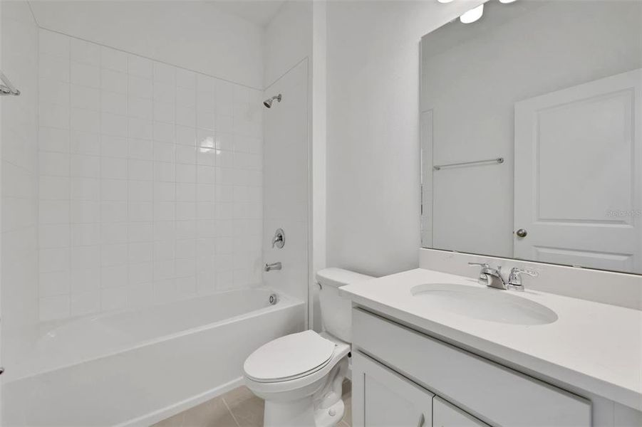 Furnished interior view inside a new home in Seaport Village, Tavares (Image 15).