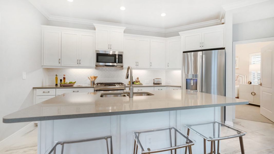 Representative furnished interior of a home built from the Patriot by Neal Communities in Boca Royale Golf & Country Club at Wellen Park, Englewood (Image 11).