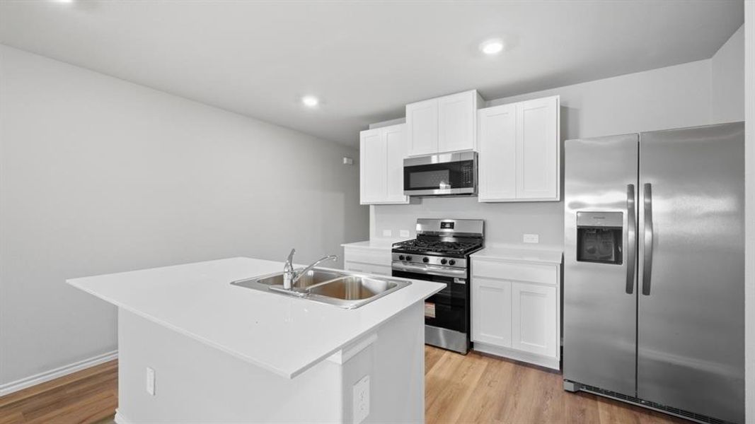 Kitchen - All Home and community information, including pricing, included features, terms, availability and amenities, are subject to change at any time without notice or obligation. All Drawings, pictures, photographs, video, square footages, floor plans, elevations, features, colors and sizes are approximate for illustration purposes only and will vary from the homes as built.