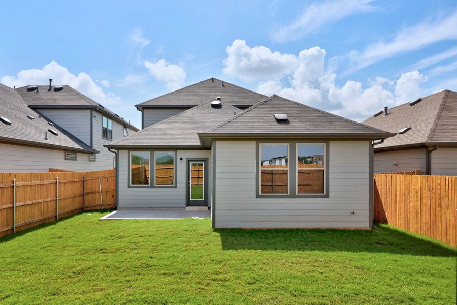 Exterior details and patio area of a home in Trinity Ranch, Elgin (Image 4).