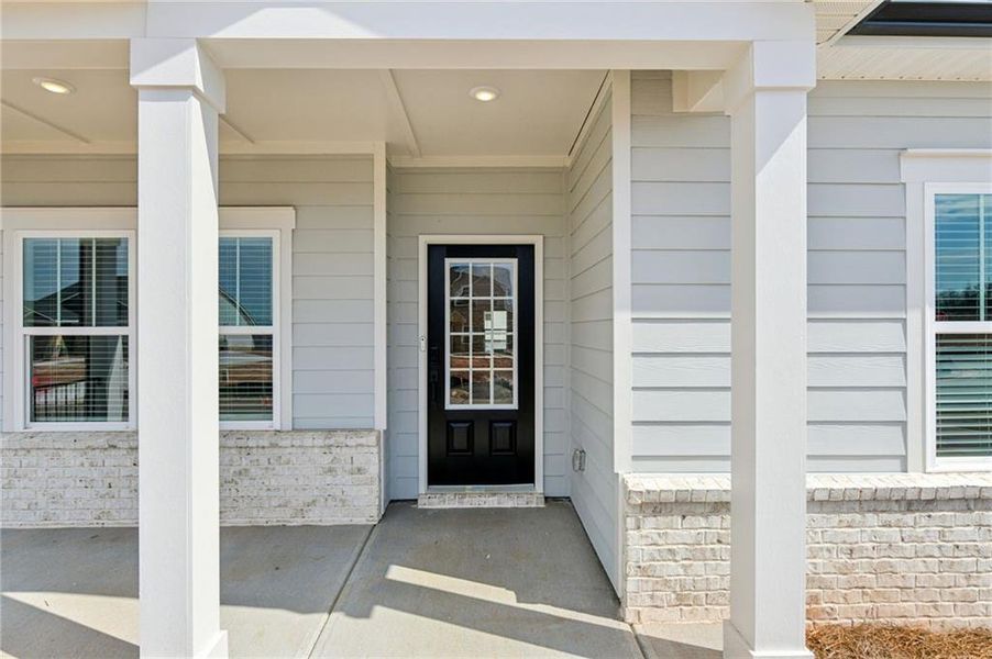 Exterior details and patio area of a home in River Pointe, Monroe (Image 3).