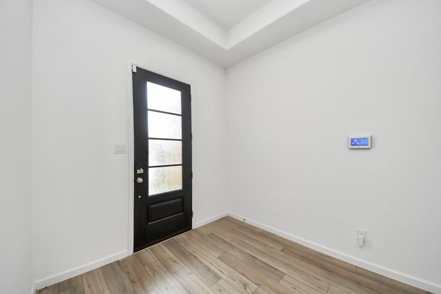 Spacious, unfurnished interior of a new home in Tavola: Fairway Collection, New Caney (Image 22).