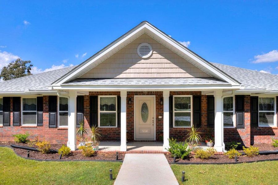 Front exterior of a new home in , Manning, SC, highlighting curb appeal (Image 2).