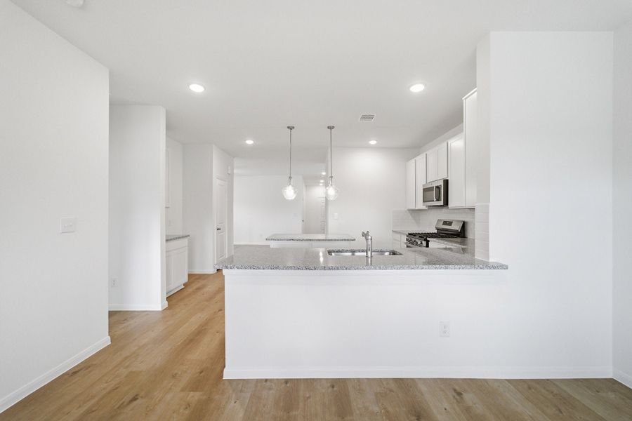 Furnished interior view inside a new home in Caney Mills, Conroe (Image 10).
