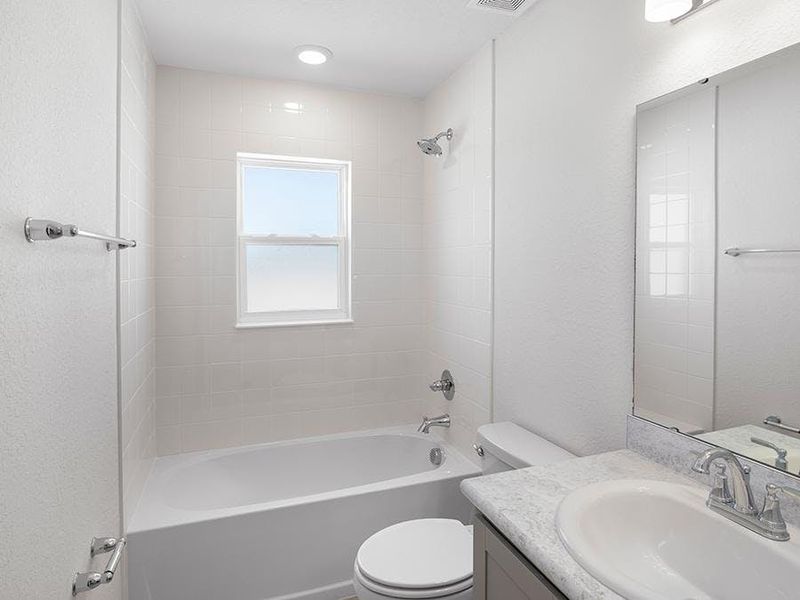 Secondary bedrooms share a convenience hall bath. Secondary bedrooms share a convenience hall bath.