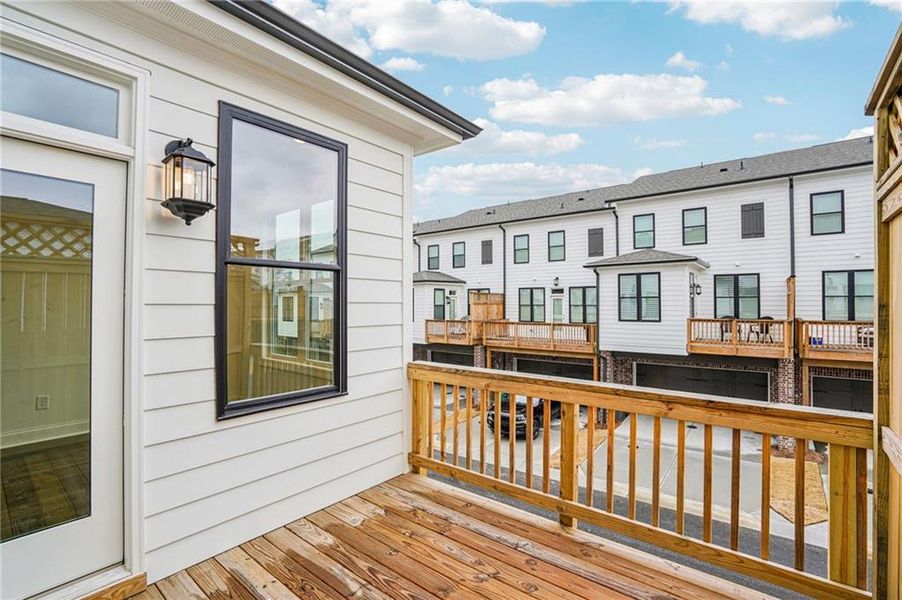 Exterior details and patio area of a home in Millcroft Townhomes, Buford (Image 20).