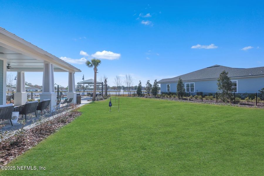 Front exterior of a new home in Everlake at Mandarin, Jacksonville, FL, highlighting curb appeal (Image 22).