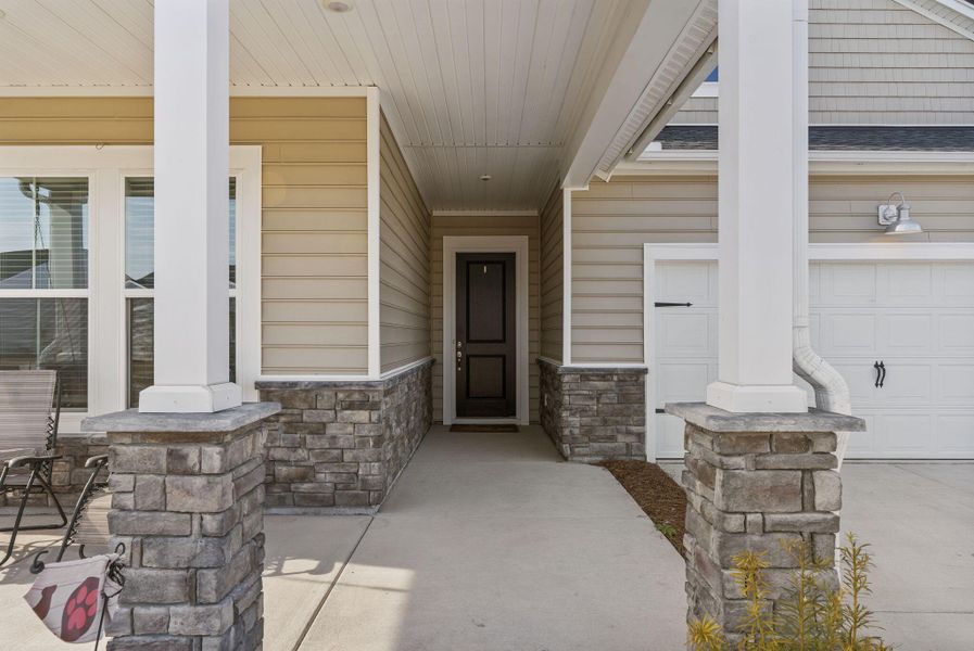 Exterior details and patio area of a home in Horizons at Summers Corner | 55+, Summerville (Image 4).