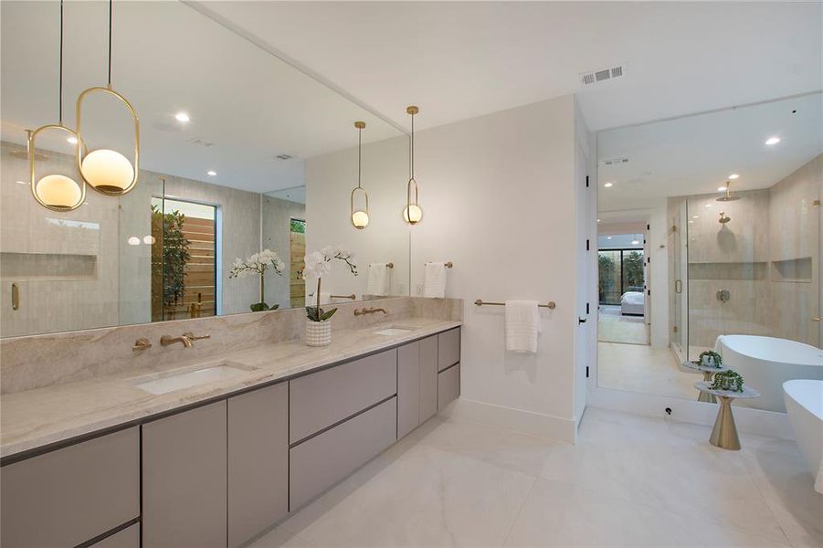 Bathroom with vanity and separate shower and tub