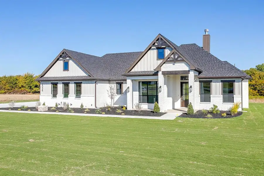 Front exterior of a new home in , Weatherford, TX, highlighting curb appeal (Image 1).