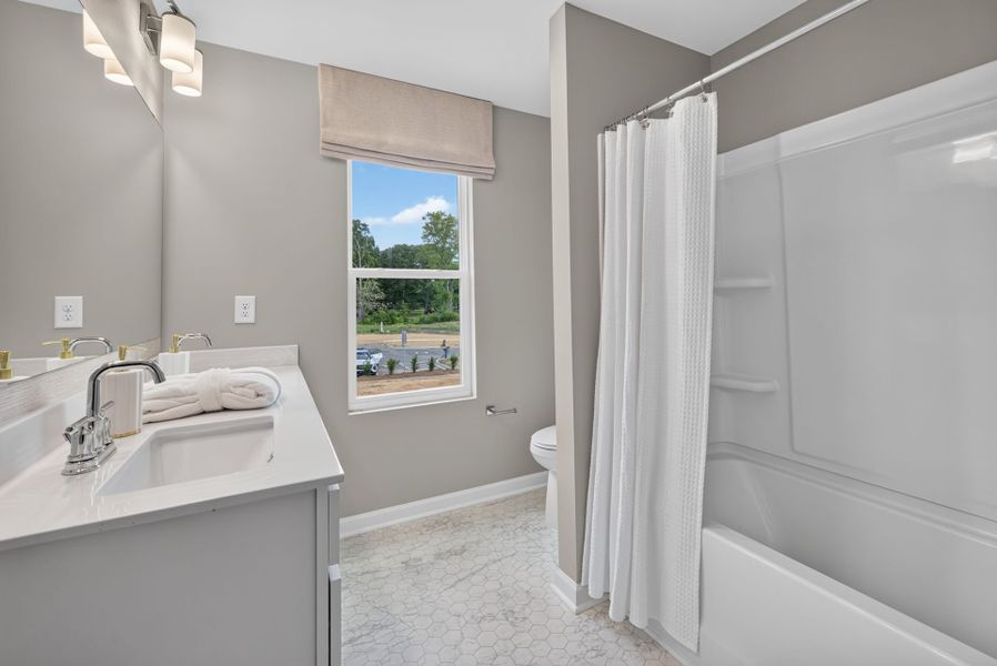 Furnished interior view inside a new home in The Ridge Townhomes, Monroe (Image 27).