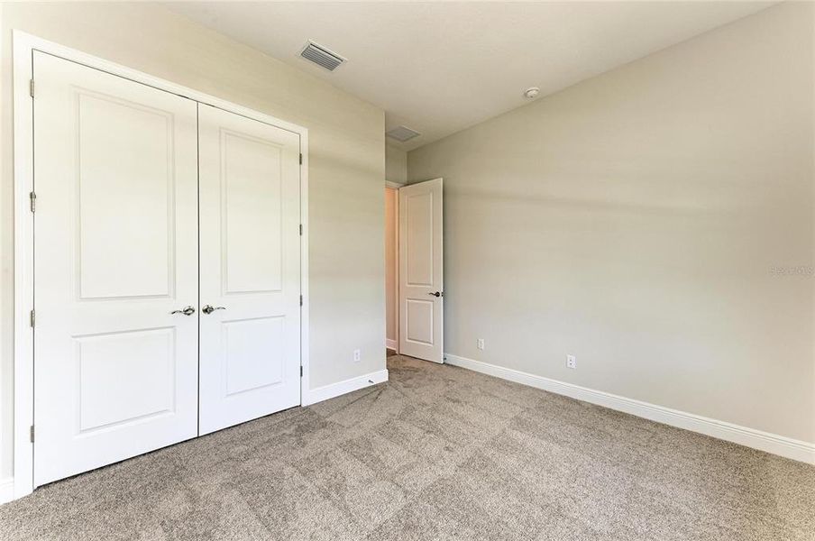 Spacious, unfurnished interior of a new home in EVERLY at Wellen Park, Venice (Image 27).