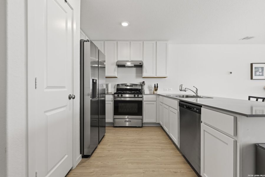 Furnished interior view inside a new home in Brookmill, San Antonio (Image 15).