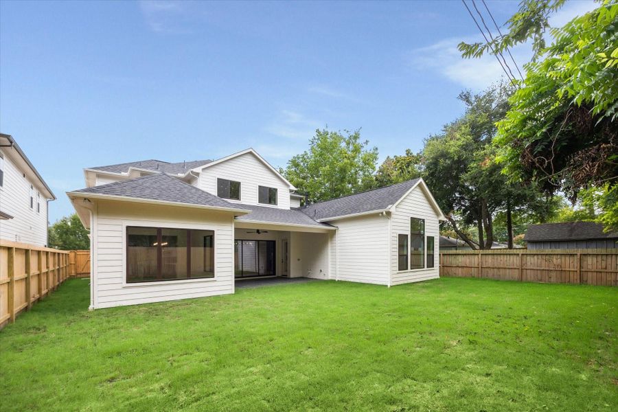 Expansive backyard with room to roam, flanked by privacy fencing and mature trees, perfect canvas for a pool, garden, or play space. Expansive backyard with room to roam, flanked by privacy fencing and mature trees, perfect canvas for a pool, garden, or play space.