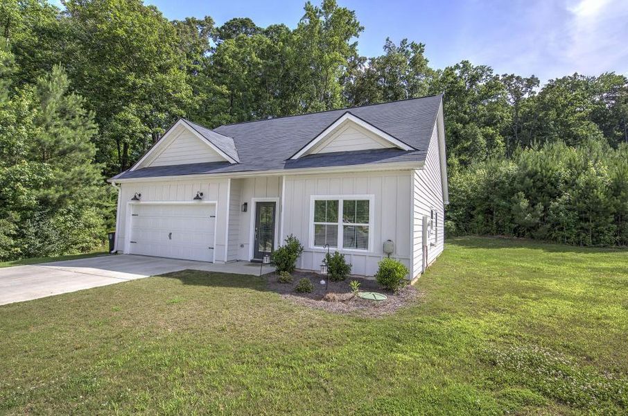 Front exterior of a new home in , Rome, GA, highlighting curb appeal (Image 2). Front exterior of a new home in , Rome, GA, highlighting curb appeal (Image 2).