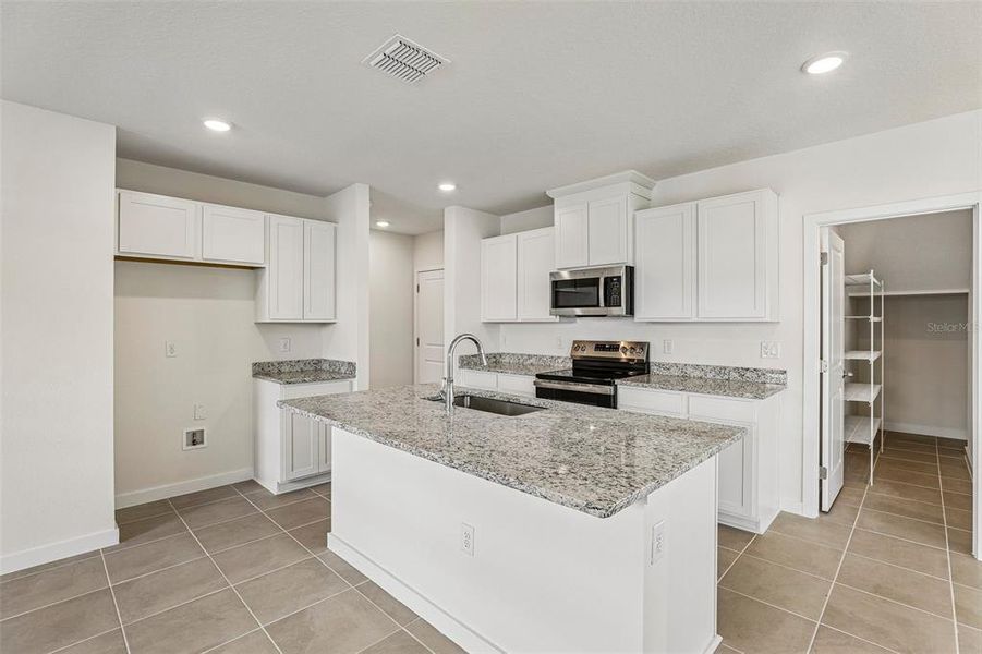 Furnished interior view inside a new home in Cyrene at Harmony, St. Cloud (Image 5).