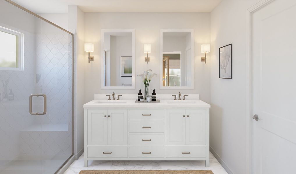 Primary bath with dual sinks and brushed nickel fixtures throughout