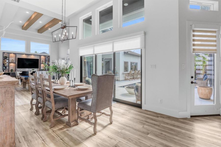 Dining area is conveniently open to the kitchen and the game room. This is an amazing space for entertaining!