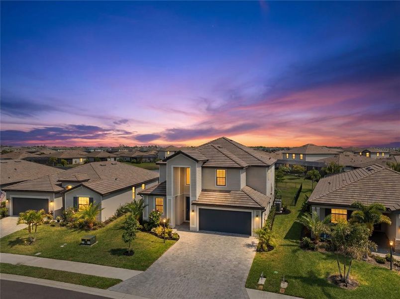 Front exterior of a new home in , Lakewood Ranch, FL, highlighting curb appeal (Image 2). Front exterior of a new home in , Lakewood Ranch, FL, highlighting curb appeal (Image 2).