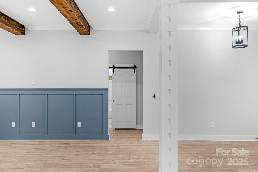 Hallway to secondary bedrooms and full bath.