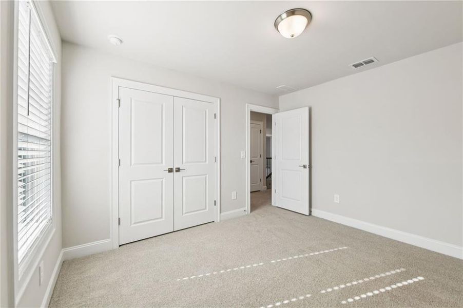 Spacious, unfurnished interior of a new home in River Pointe, Monroe (Image 49).