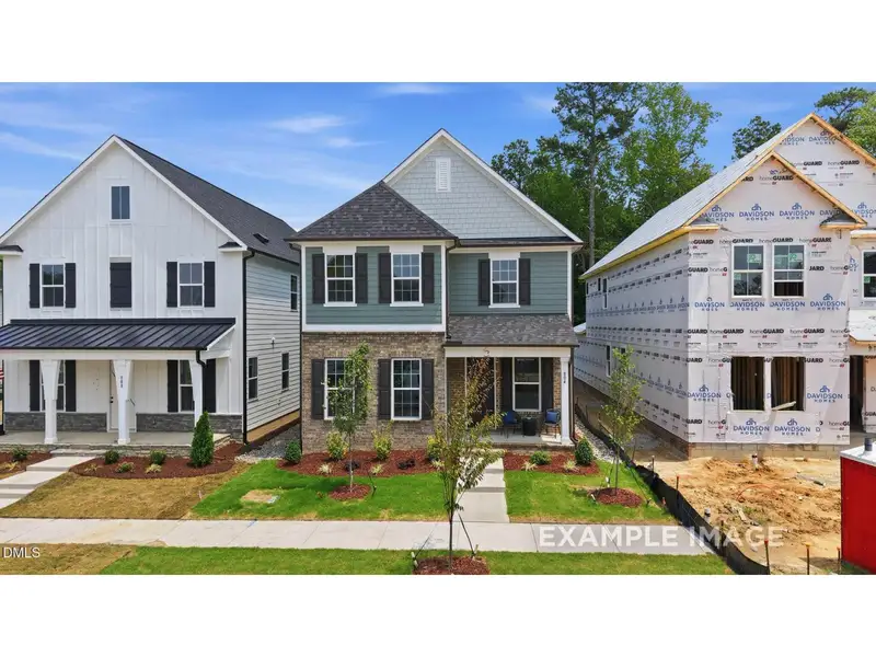 Front exterior of a new home in Forestville Yard, Knightdale, NC, highlighting curb appeal (Image 1). Front exterior of a new home in Forestville Yard, Knightdale, NC, highlighting curb appeal (Image 1).