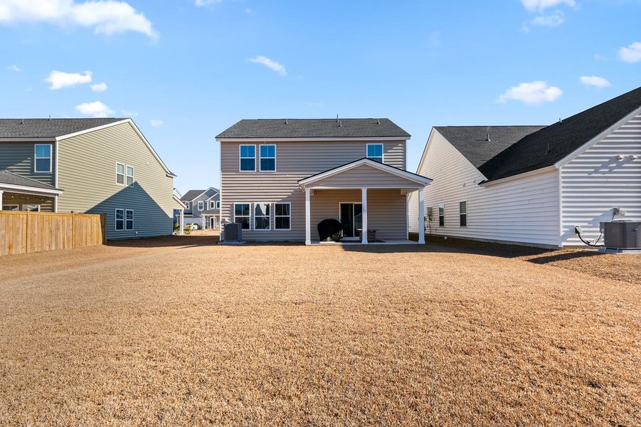 Exterior details and patio area of a home in Heron's Walk at Summers Corner, Summerville (Image 4).