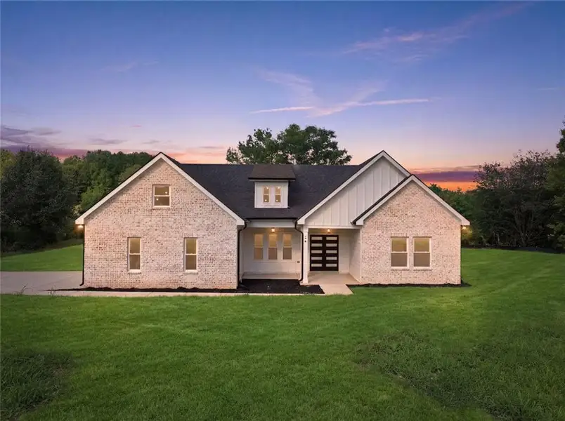 Front exterior of a new home in , Commerce, GA, highlighting curb appeal (Image 25). Front exterior of a new home in , Commerce, GA, highlighting curb appeal (Image 25).