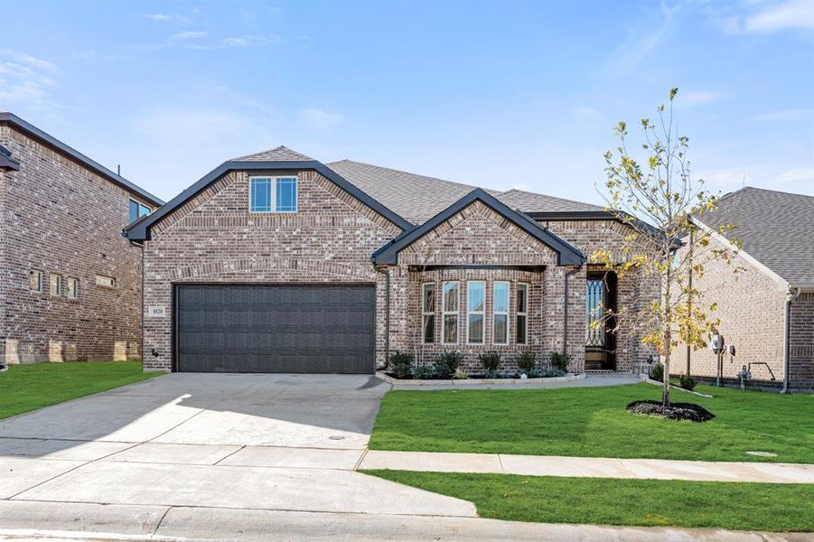 Front exterior of a new home in Eagle Glen Elements, Alvarado, TX, highlighting curb appeal (Image 25).