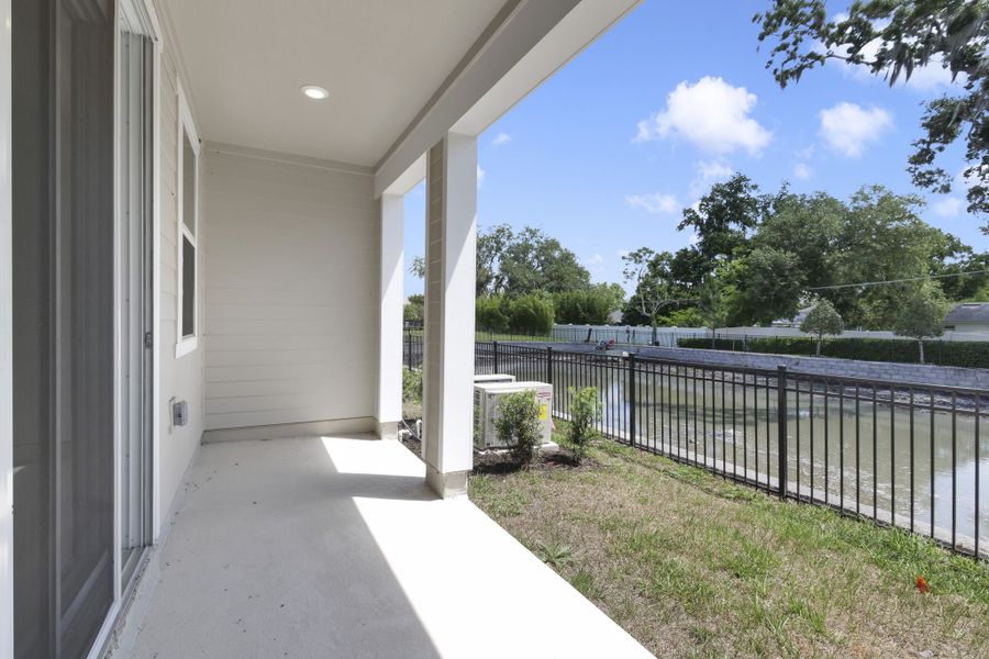 Exterior details and patio area of a home in Towns at Riverwalk, Sanford (Image 3). Exterior details and patio area of a home in Towns at Riverwalk, Sanford (Image 3).