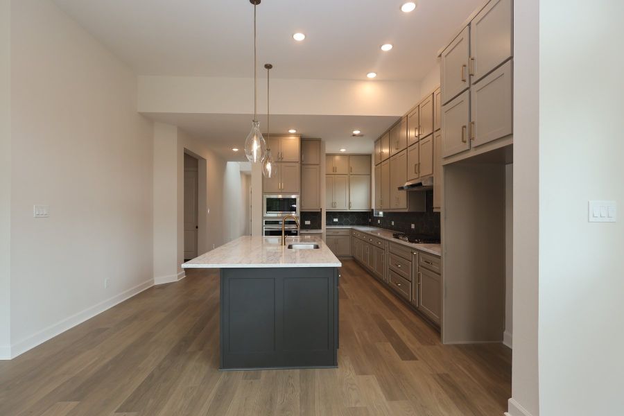 Furnished interior view inside a new home in COLTON - Reserve Collection, Todd Mission (Image 8). Furnished interior view inside a new home in COLTON - Reserve Collection, Todd Mission (Image 8).