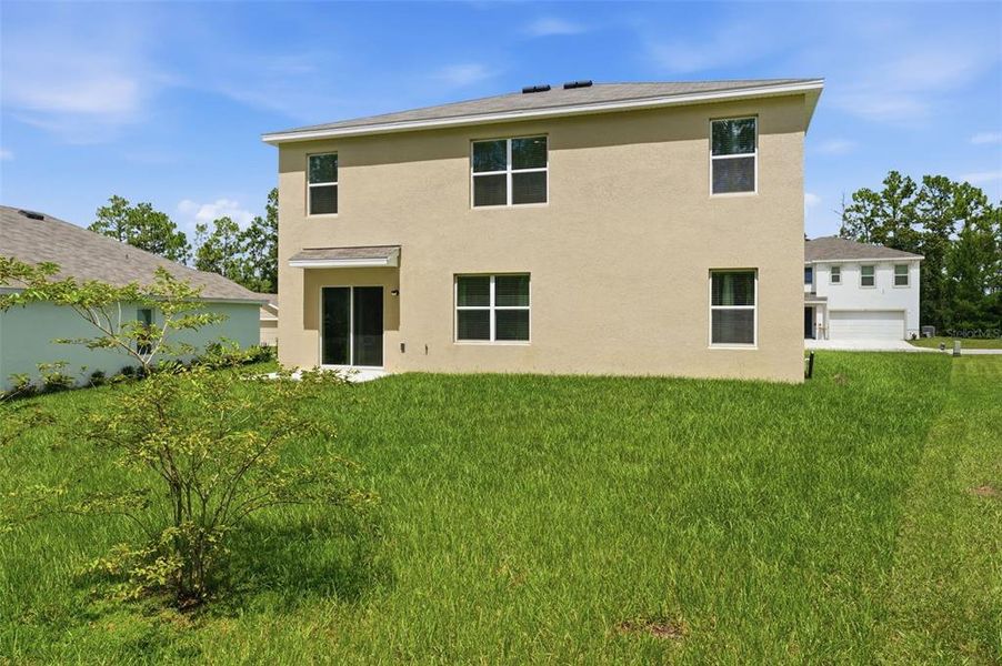 Exterior details and patio area of a home in Lake Diamond, Ocala (Image 31).
