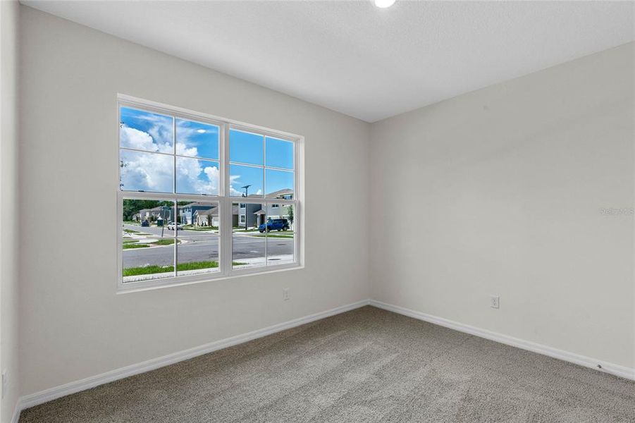 Spacious, unfurnished interior of a new home in Harmony at Lake Eloise, Winter Haven (Image 20).