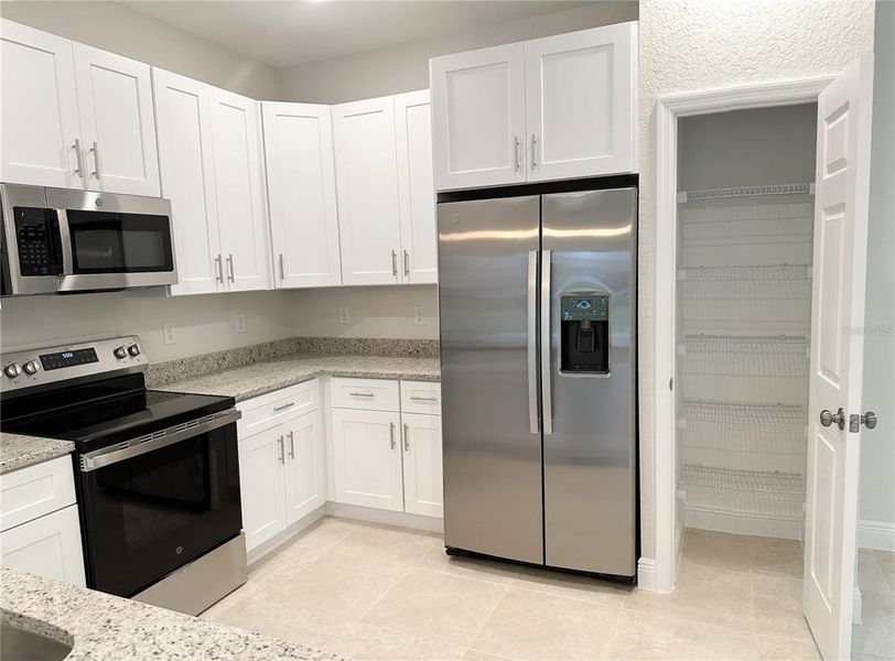 Furnished interior view inside a new home in , North Port (Image 8).