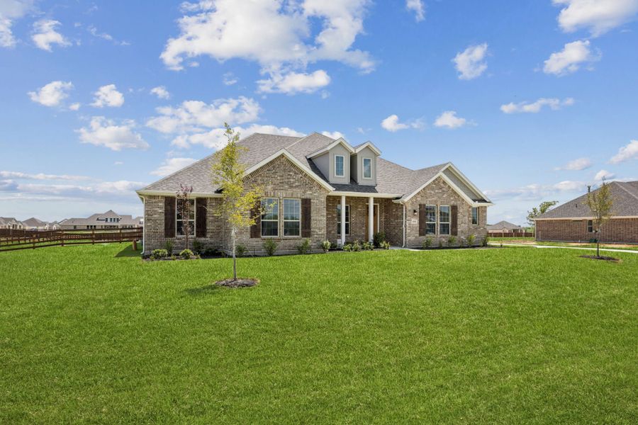 Front exterior of a new home in Ellis Ranch Estates, Waxahachie, TX, highlighting curb appeal (Image 19).