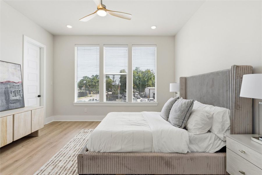 A generously sized secondary bedroom measuring 14 by 13, offering the scale typically reserved for a primary suite. A generously sized secondary bedroom measuring 14 by 13, offering the scale typically reserved for a primary suite.