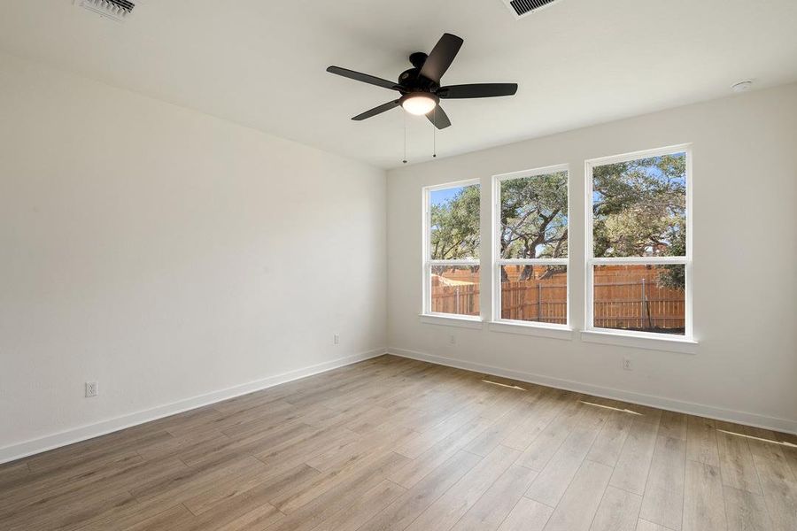 Spacious, unfurnished interior of a new home in Heritage, Dripping Springs (Image 29).