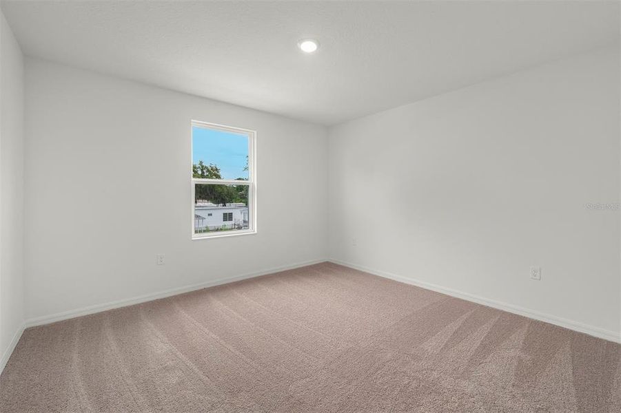 Spacious, unfurnished interior of a new home in Tula Parc, Astatula (Image 17).